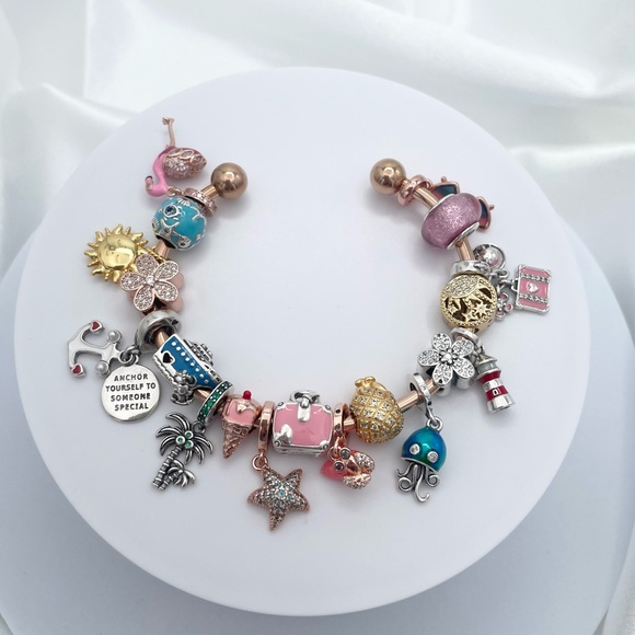 Linx Stainless Rose Gold Open Bangle with Cruise Themed Charms